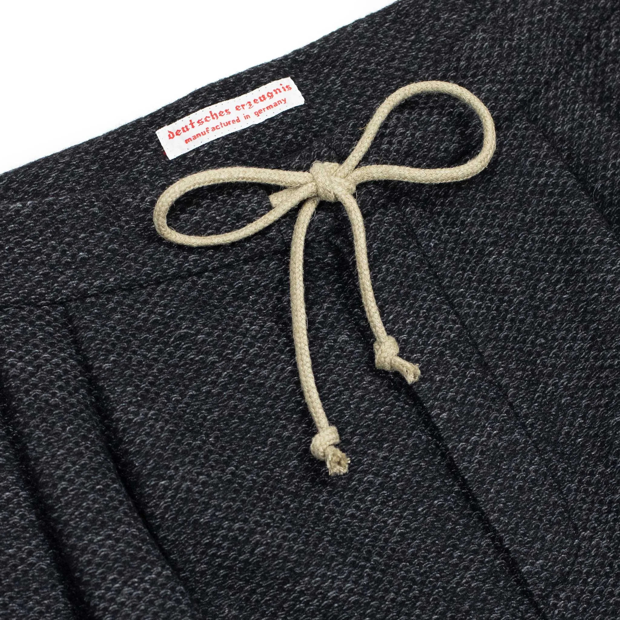 Pleated drawstring trousers in charcoal and grey jacquard deadstock vintage wool