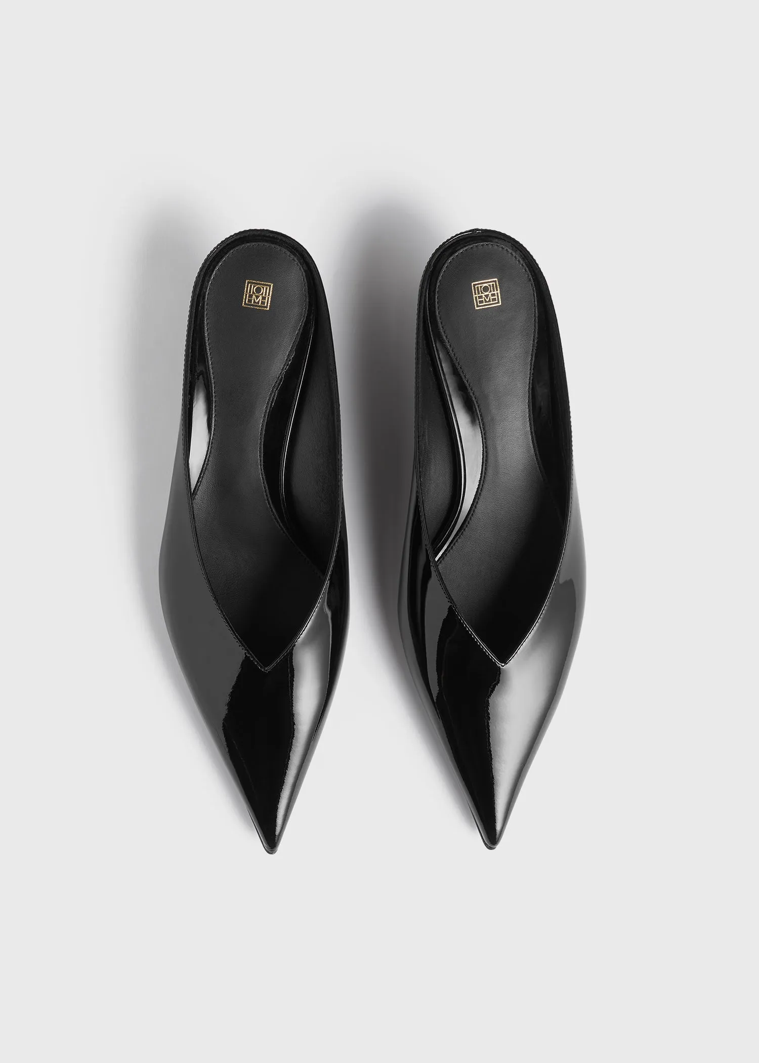 Sharp patent-leather wedge mules black